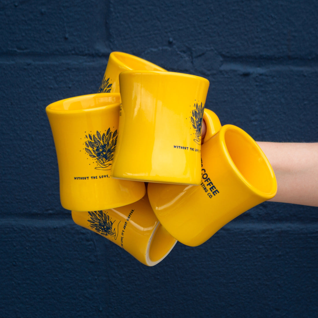 Hand holding bright yellow PT&